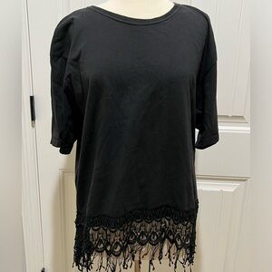 #2017. St. Joanne Short Sleeve Black Top with Fringe Detail at the Hem. Size XL